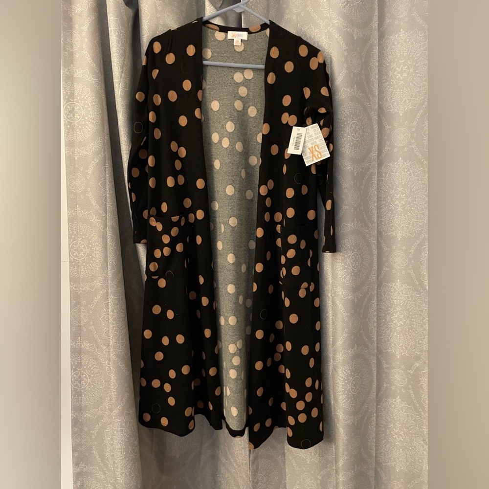 LULAROE SARAH Polka Dot Cardigan
Duster Black XS
$25.00 USD*